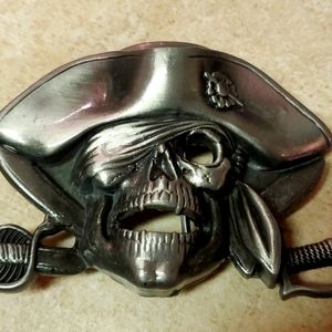 Pirate skull belt buckle fits 1.5 inch belt approximately 3.5" wide.